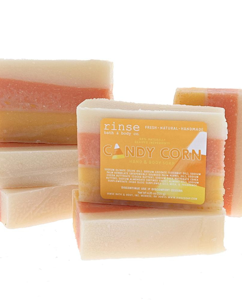 Candy Corn bar soap standing to show the three poured layers through the bar. Rinse Bath & Body Co.