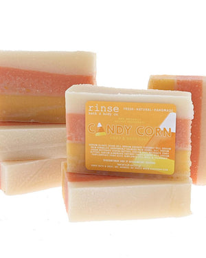 Candy Corn bar soap standing to show the three poured layers through the bar. Rinse Bath & Body Co.