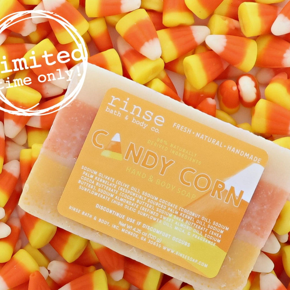 Candy Corn bar soap in its layered orange, yellow and white pour — a Halloween bar that looks like the candy and smells like vanilla sugar. Rinse Bath & Body Co.