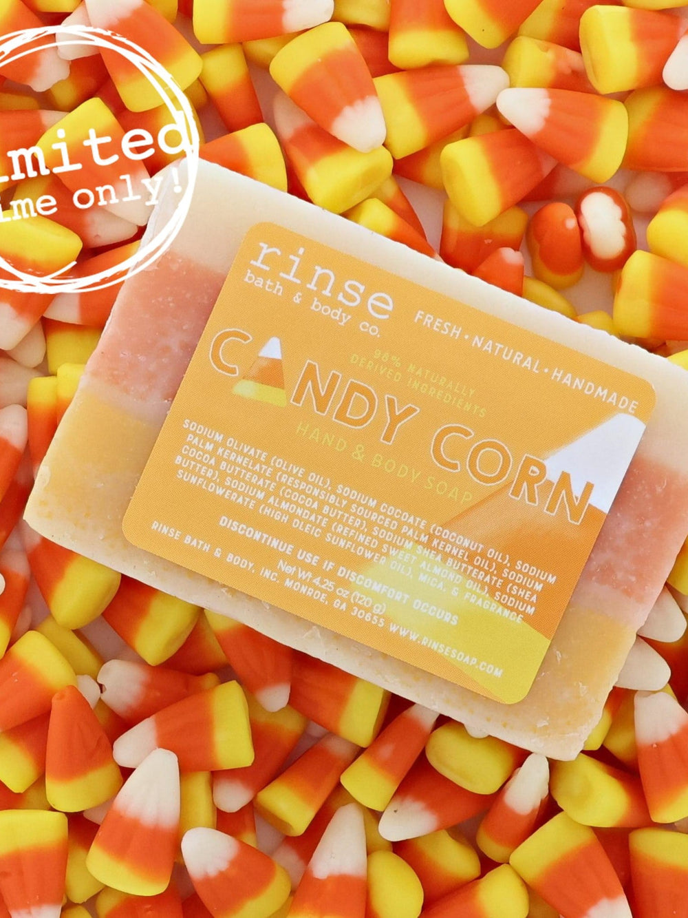 Candy Corn bar soap in its layered orange, yellow and white pour — a Halloween bar that looks like the candy and smells like vanilla sugar. Rinse Bath & Body Co.