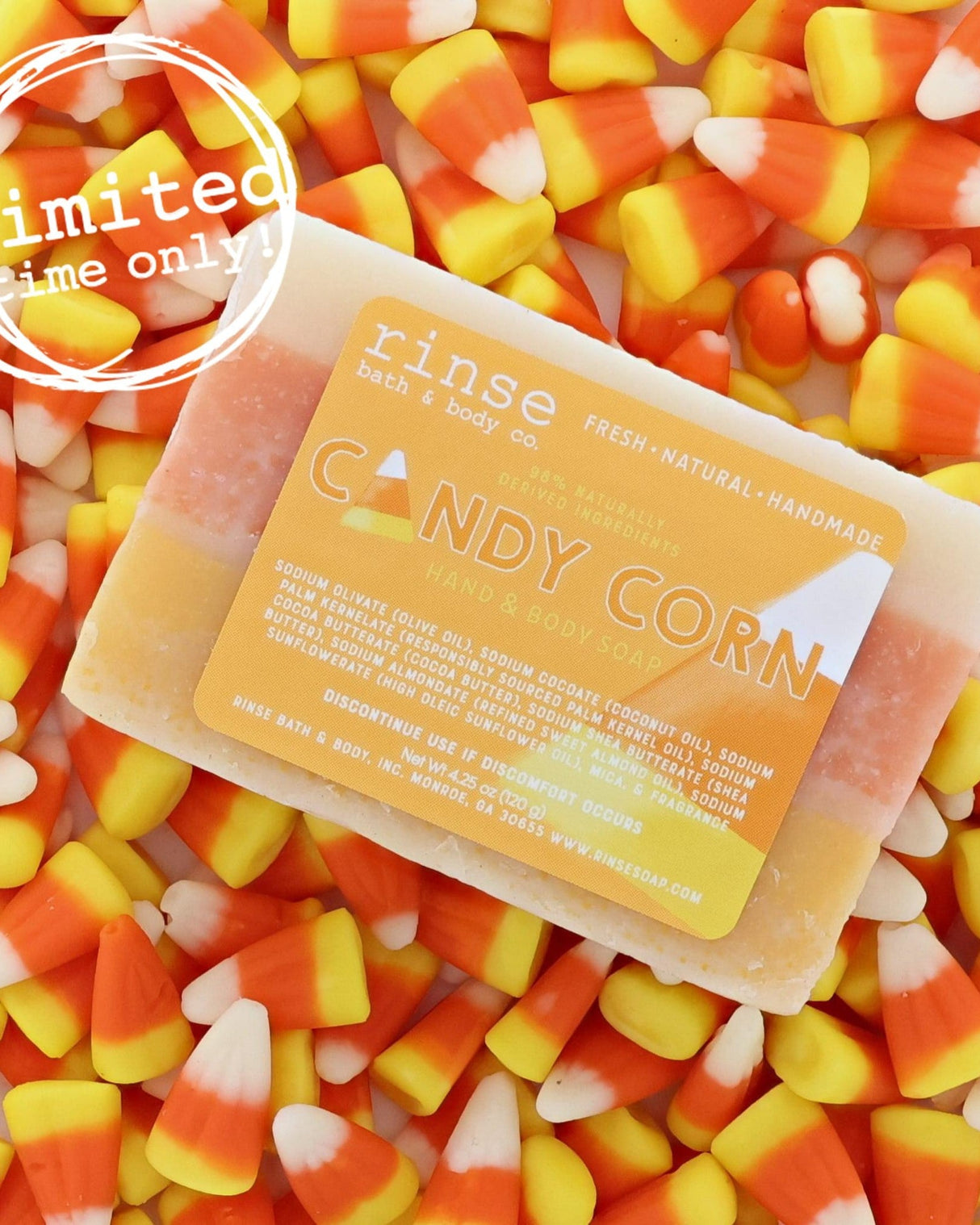 Candy Corn bar soap in its layered orange, yellow and white pour — a Halloween bar that looks like the candy and smells like vanilla sugar. Rinse Bath & Body Co.