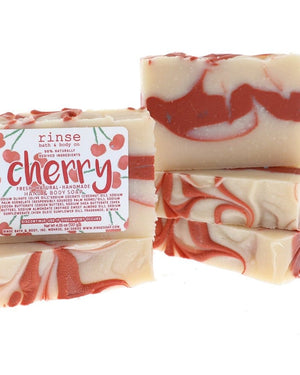 Four Cherry soap bars stack showing creamy red marble — cherry label crisp on clean bright white