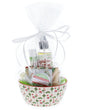 Christmas Cookie holiday bowl gift wrapped in clear cellophane with white raffia — tree-berry ceramic under bright light