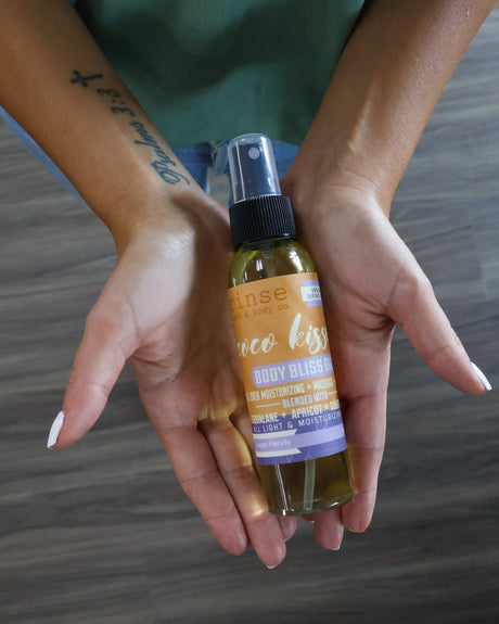 Coco Kissed Body Bliss oil bottle by Rinse Bath & Body