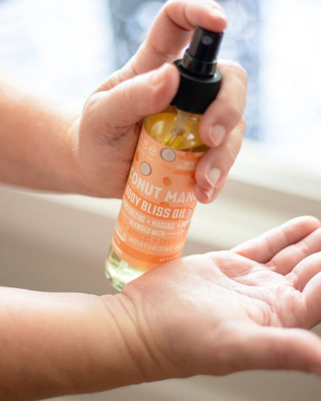 Coconut Mango Body Bliss oil bottle by Rinse Bath & Body