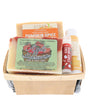 Fall berry till flat lay — Apple Harvest and Pumpkin Spice soaps with Warm Apple Cider Pucker Stick and Pumpkin Spice Skin Stick in grey tissue