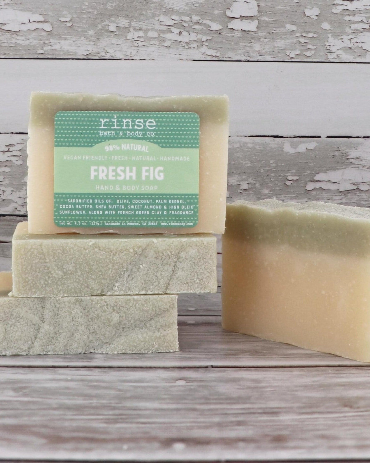 Fresh Fig bar soap stylized stack on rustic wood — cream and French green clay lifestyle