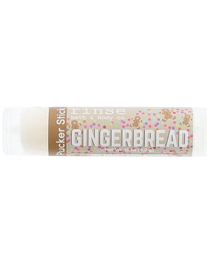 Gingerbread Pucker Stick lies horizontal — gingerbread-man confetti label on clean white