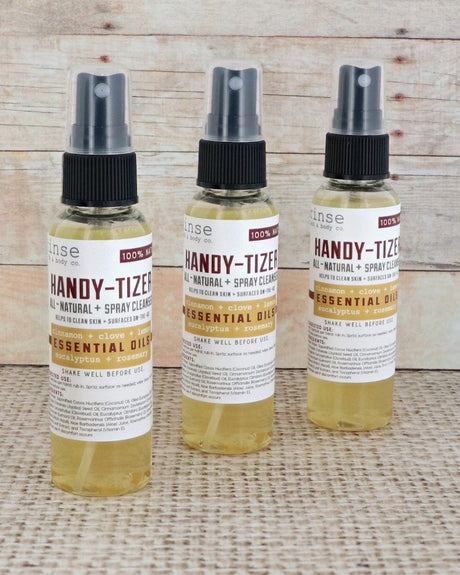 Thievery Handy-Tizer close up, showing the fine mist nozzle — sized for a bag, a desk or a car door. Rinse Bath & Body Co.