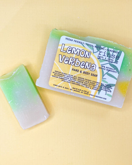 Full Lemon Verbena bar and thin slice on buttery yellow — lime green marble in soft flat-lay light