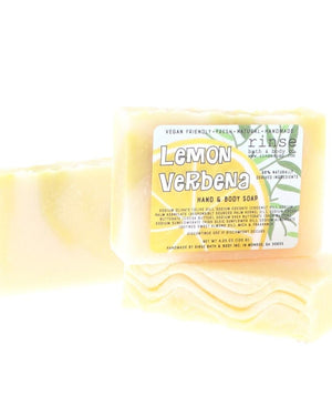 Three Lemon Verbena soap bars stack showing cream yellow green marble — citrus label on clean bright white