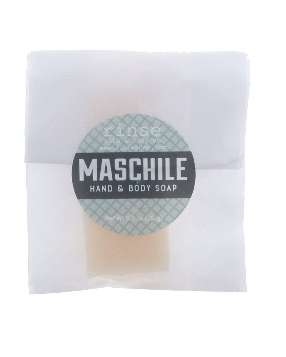 Maschile soap slice in translucent wrap — grey-blue circle sticker on clean bright white