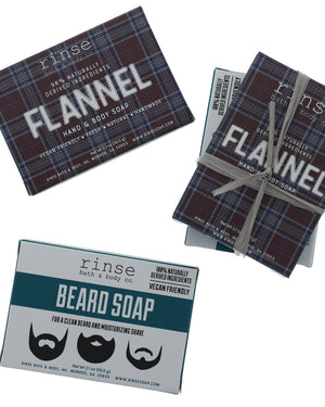 Flannel and Beard Soap mini bars displayed on bright white — plaid and teal boxes with one pair tied in gray raffia