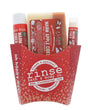 The Warm Apple Cider fry-box gift set open to show its pieces in a kraft fry carton — spiced apple, clove and brown sugar, ready to hand over. Rinse Bath & Body Co.