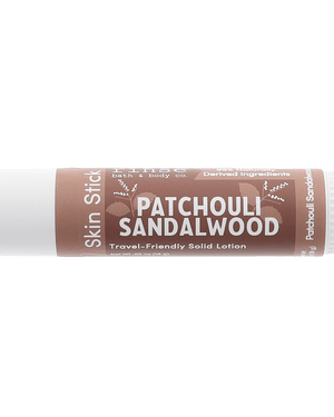 Patchouli Sandalwood Skin Stick — travel-friendly solid lotion in a twist-up tube. Rinse Bath & Body Co.