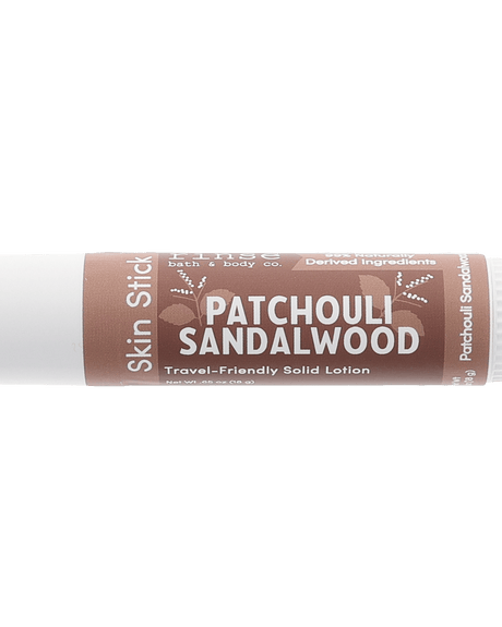 Patchouli Sandalwood Skin Stick — travel-friendly solid lotion in a twist-up tube. Rinse Bath & Body Co.