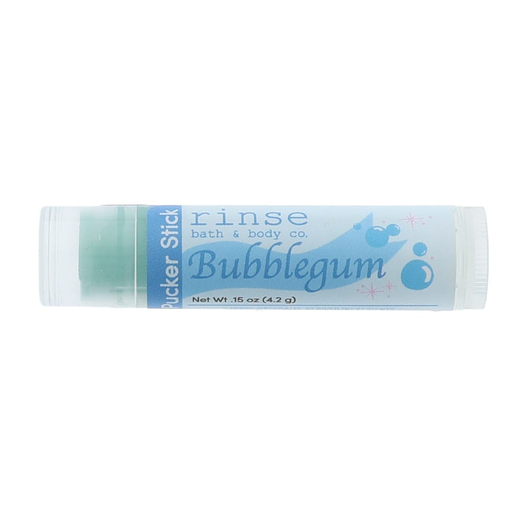 Bubblegum Pucker Stick lies horizontal — sky-blue label, green balm, and bubble graphics on white