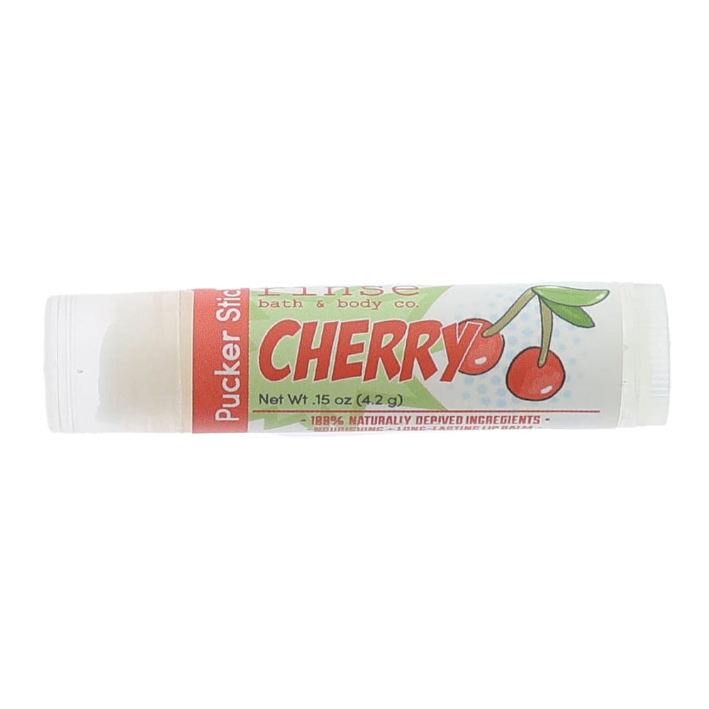 Cherry Pucker Stick lying on bright white — bold red CHERRY type and twin cherry icon in clean studio light
