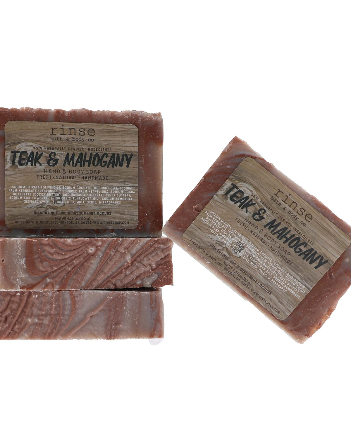 Teak & Mahogany soap stack shows wood-grain labels — reddish brown marble on clean bright white