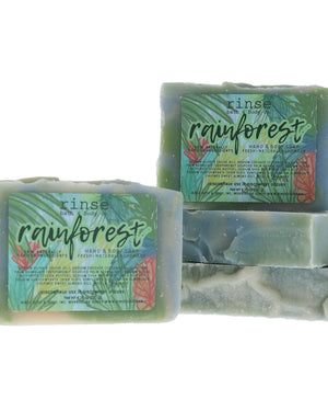 Rainforest soap with seafoam blue cream marble — tropical leaf label on clean bright white