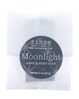 Moonlight soap slice in frosted glassine — black starry circle sticker on clean bright white