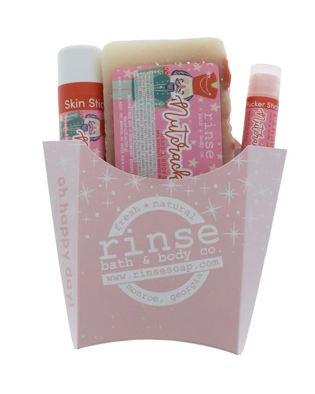 Pink starry fry box holding Nutcracker soap Skin Stick and Pucker Stick — nutcracker art on bright white