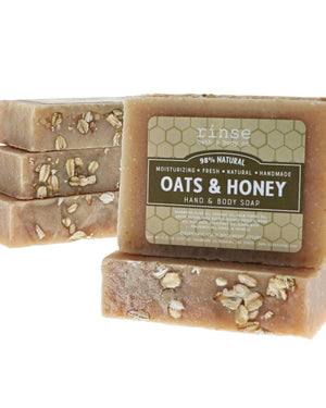 Oats & Honey bars stacked to show the oat-flecked top — gently exfoliating, made for sensitive and easily irritated skin. Rinse Bath & Body Co.