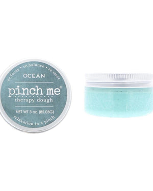 Ocean Pinch Me Therapy Dough tin standing on bright white — scented stress-relief dough in branded metal tin.