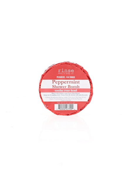 Peppermint Shower Bomb sits wrapped in foil with its current Rinse label; shown for display; listing is for one (1)