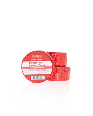 Two Peppermint Shower Bombs stack in foil wrap with the current Rinse label; shown for display; listing is for one (1)