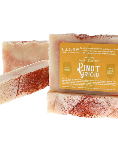Pinot Grigio bar and thin slice on bright white — peach rose swirls dusted with reddish orange flecks