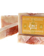Pinot Grigio bar and thin slice on bright white — peach rose swirls dusted with reddish orange flecks