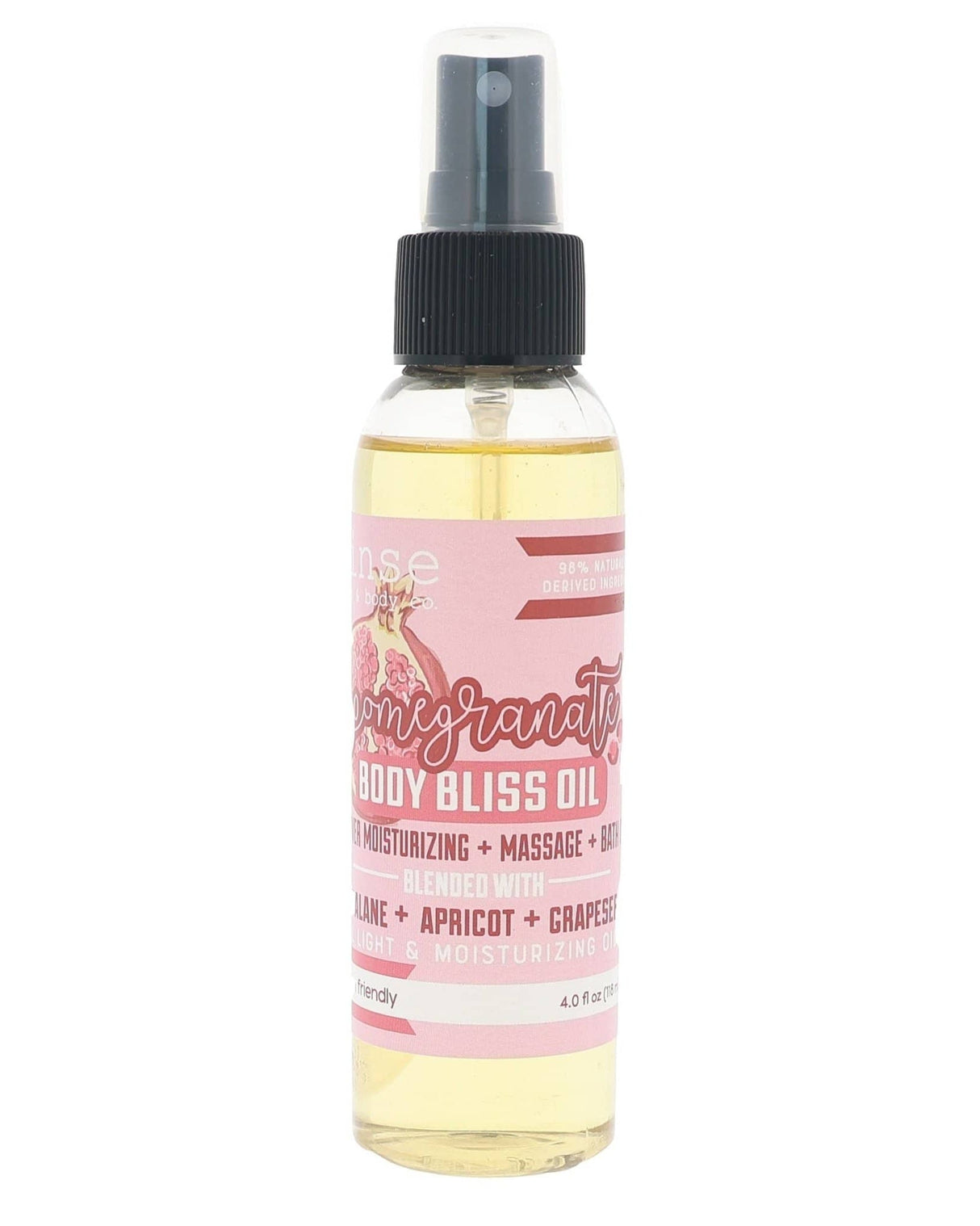 Pomegranate Body Bliss oil in its bottle with the pink harvest label — bright pomegranate over grapeseed and apricot kernel. Rinse Bath & Body Co.