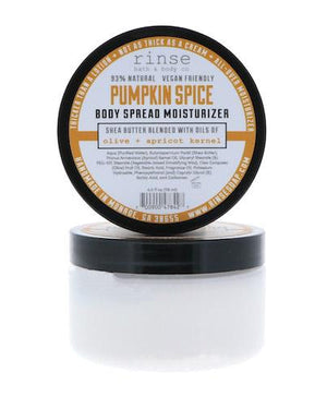 Pumpkin Spice body spread in its tub — a thick shea-butter moisturizer in nutmeg, clove and brown sugar. Rinse Bath & Body Co.