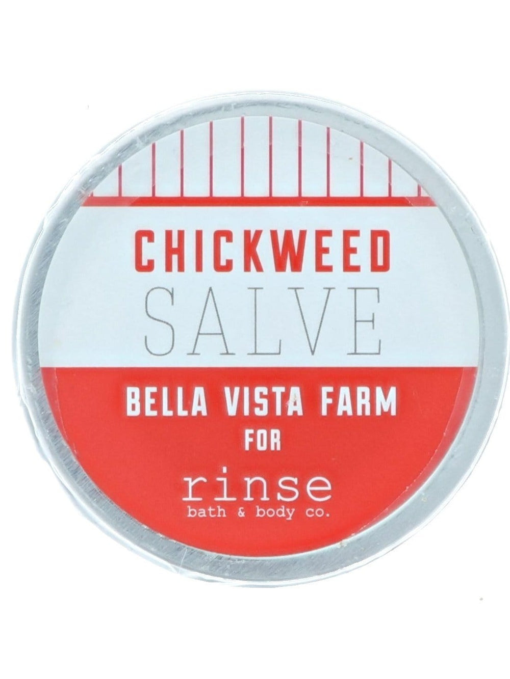 Round Chickweed Salve tin faces forward — red white Bella Vista Farm lid on clean bright white
