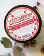 natural body lotion in Spiced Cranberry by Rinse Bath & Body - alternate angle — 4:5 card crop