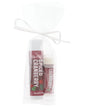 Maroon Spiced Cranberry stick duo nestled in sheer white mesh — ribbon bow on clean bright white