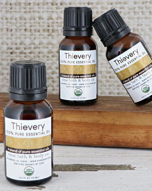 Thievery essential oil bottle showing its USDA organic seal — undiluted, for diffusers and your own blends. Rinse Bath & Body Co.