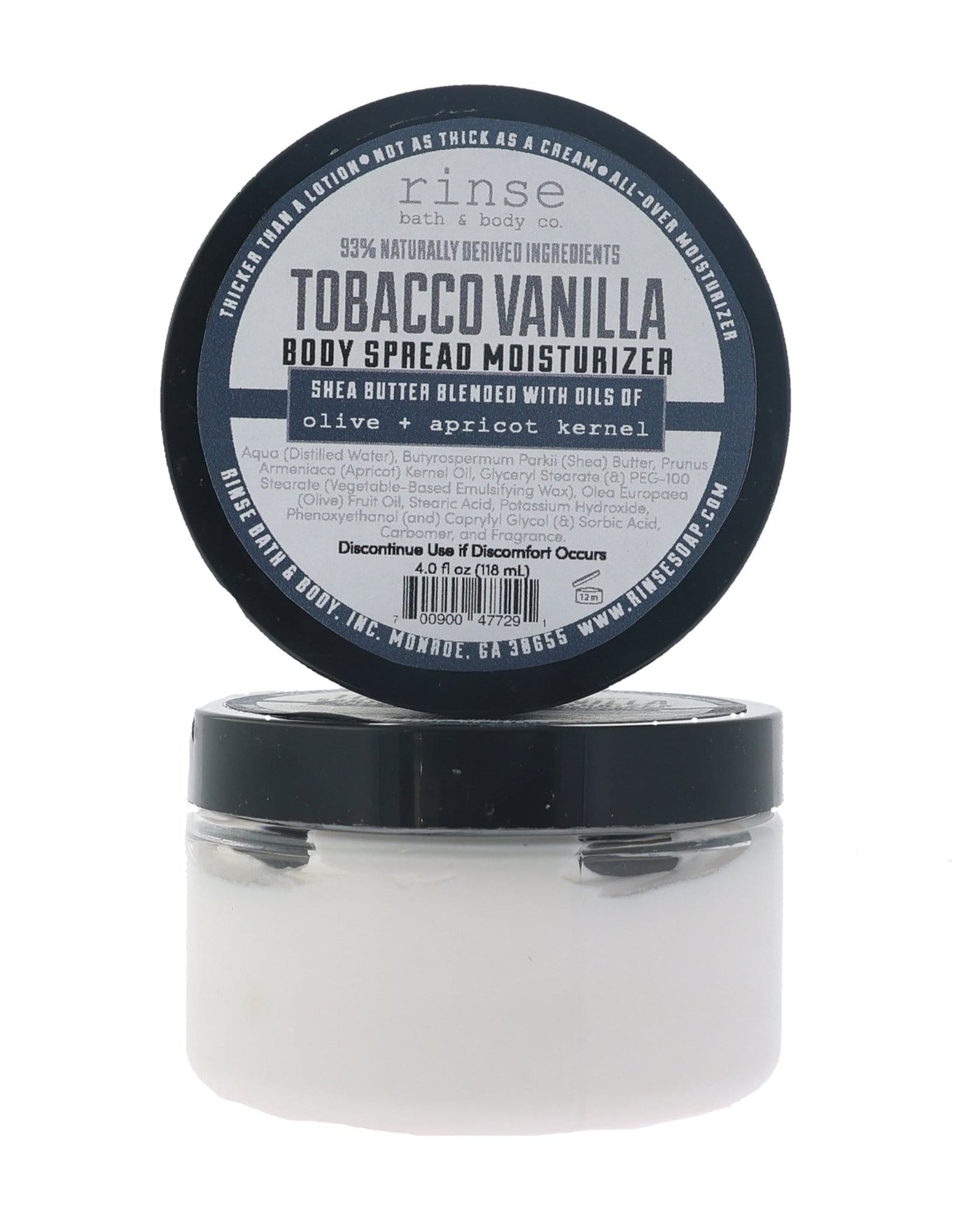 Tobacco Vanilla body spread in its tub with the lid off, showing the whipped butter inside. Rinse Bath & Body Co.