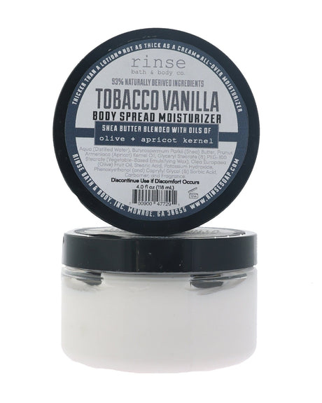 Tobacco Vanilla body spread in its tub with the lid off, showing the whipped butter inside. Rinse Bath & Body Co.
