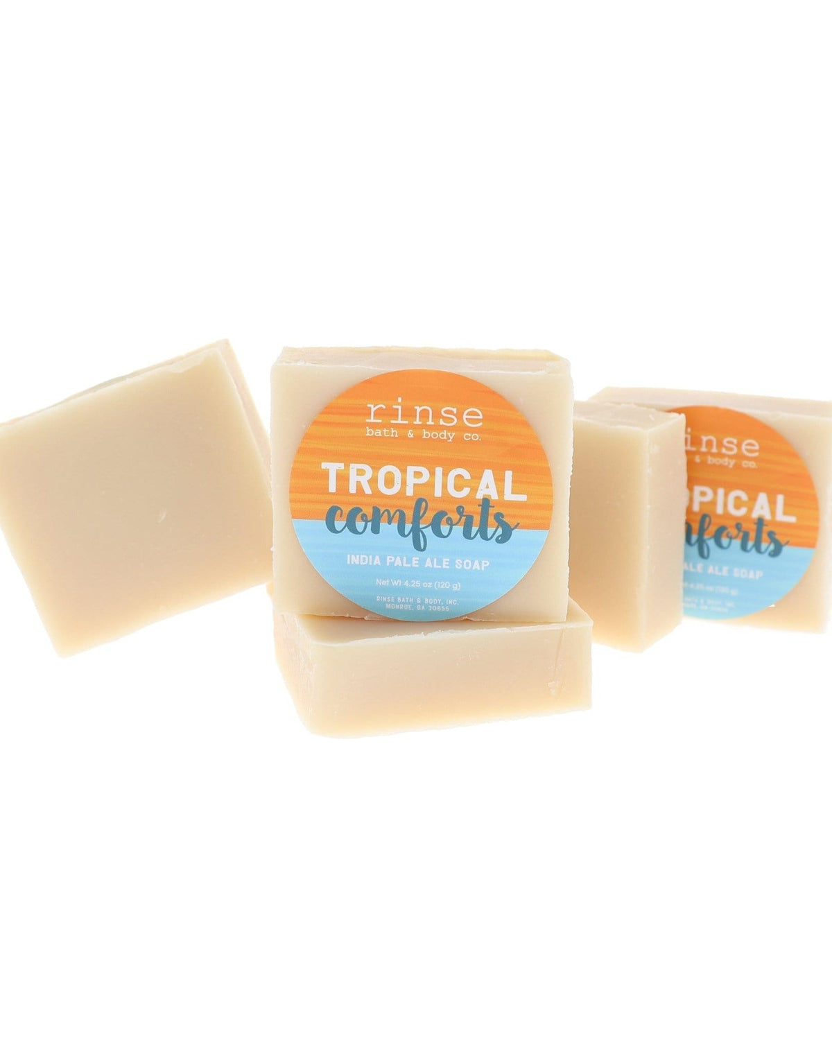 Tropical Comforts IPA beer soap stack — orange blue circle labels on clean bright white