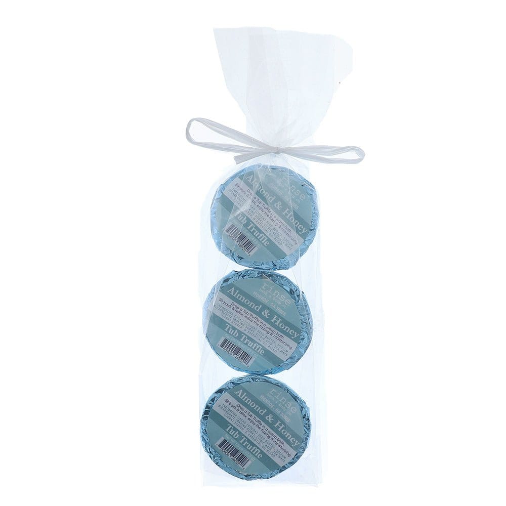 Three Almond & Honey Tub Truffles stacked in a clear bag with white bow — pale blue foil on bright white