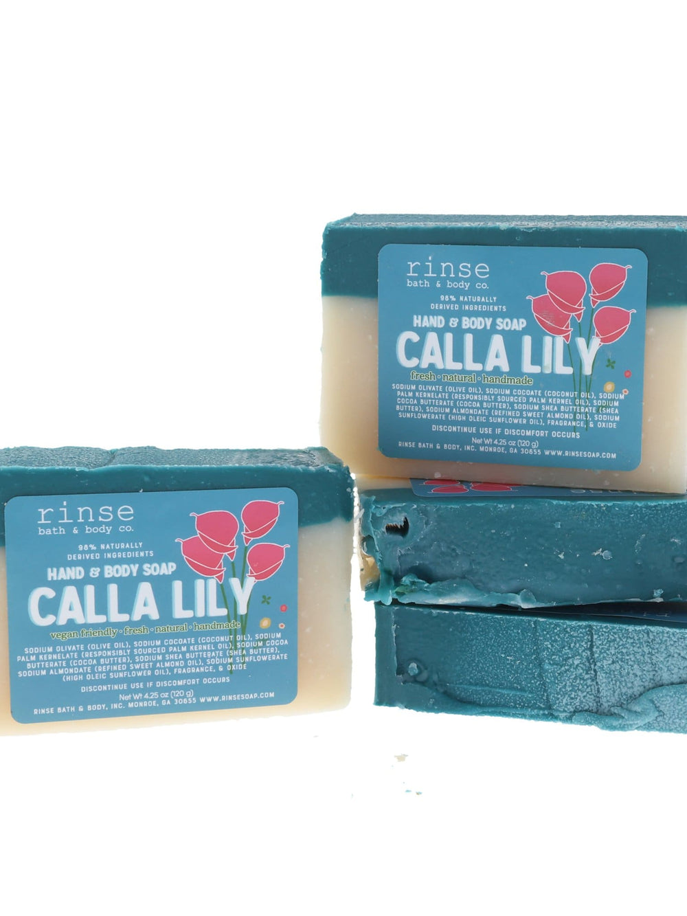 Four Calla Lily bars stack showing teal tops — pink lily label crisp on clean bright white