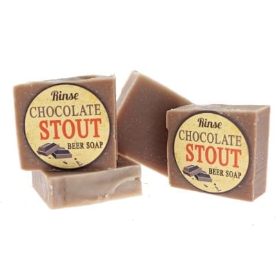 Chocolate Stout beer soaps rest and lean — earthy brown bars on clean bright white studio