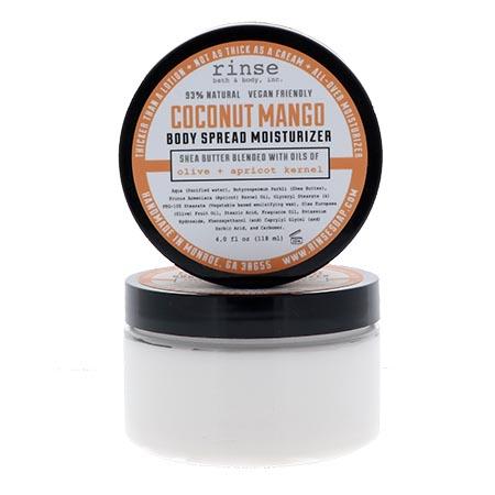 Two Coconut Mango Body Spread jars stacked on bright white — orange lid label and thick white cream through clear plastic