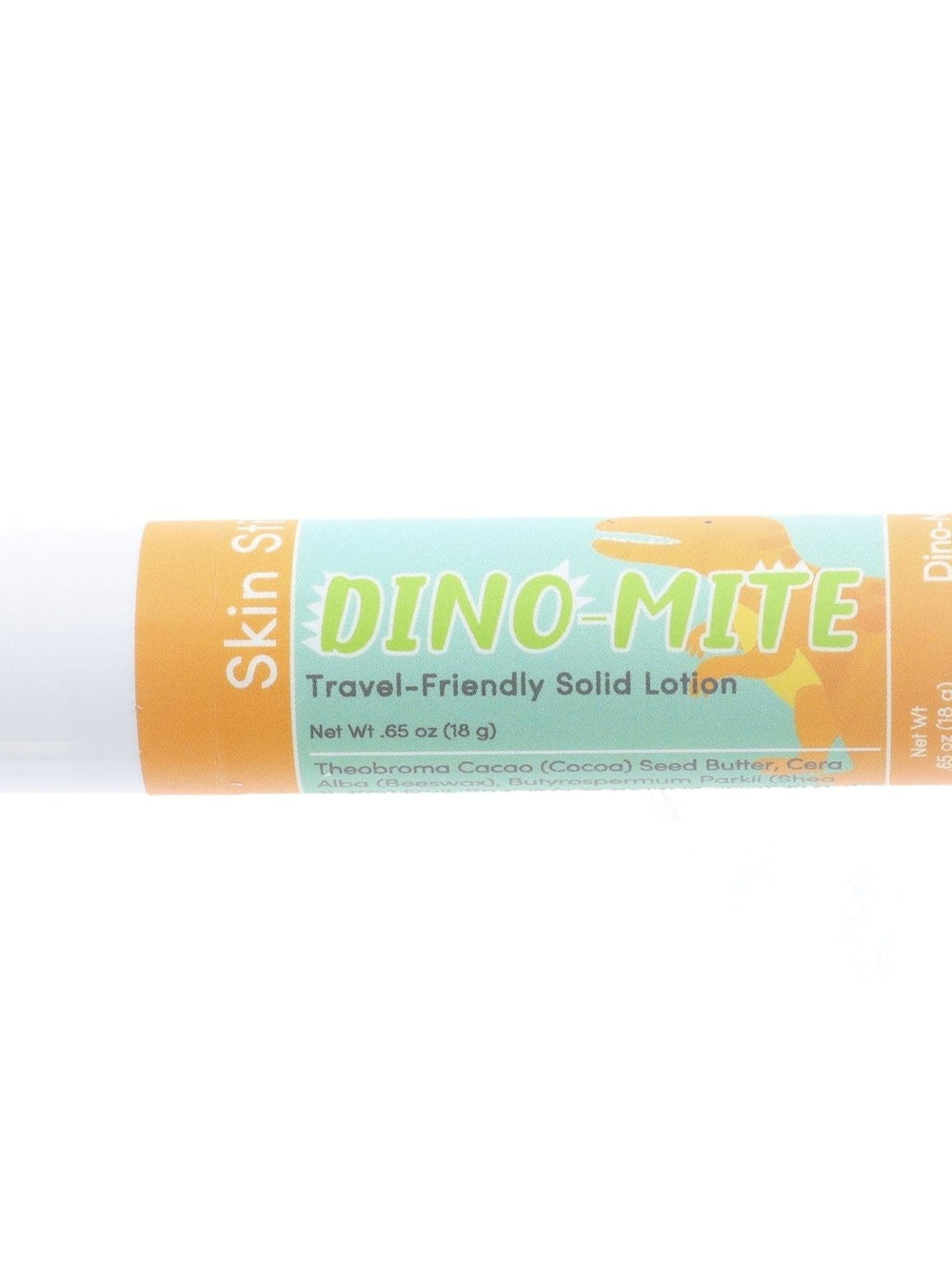 Dino-Mite Skin Stick lying on bright white — orange dino silhouette label in clean studio light