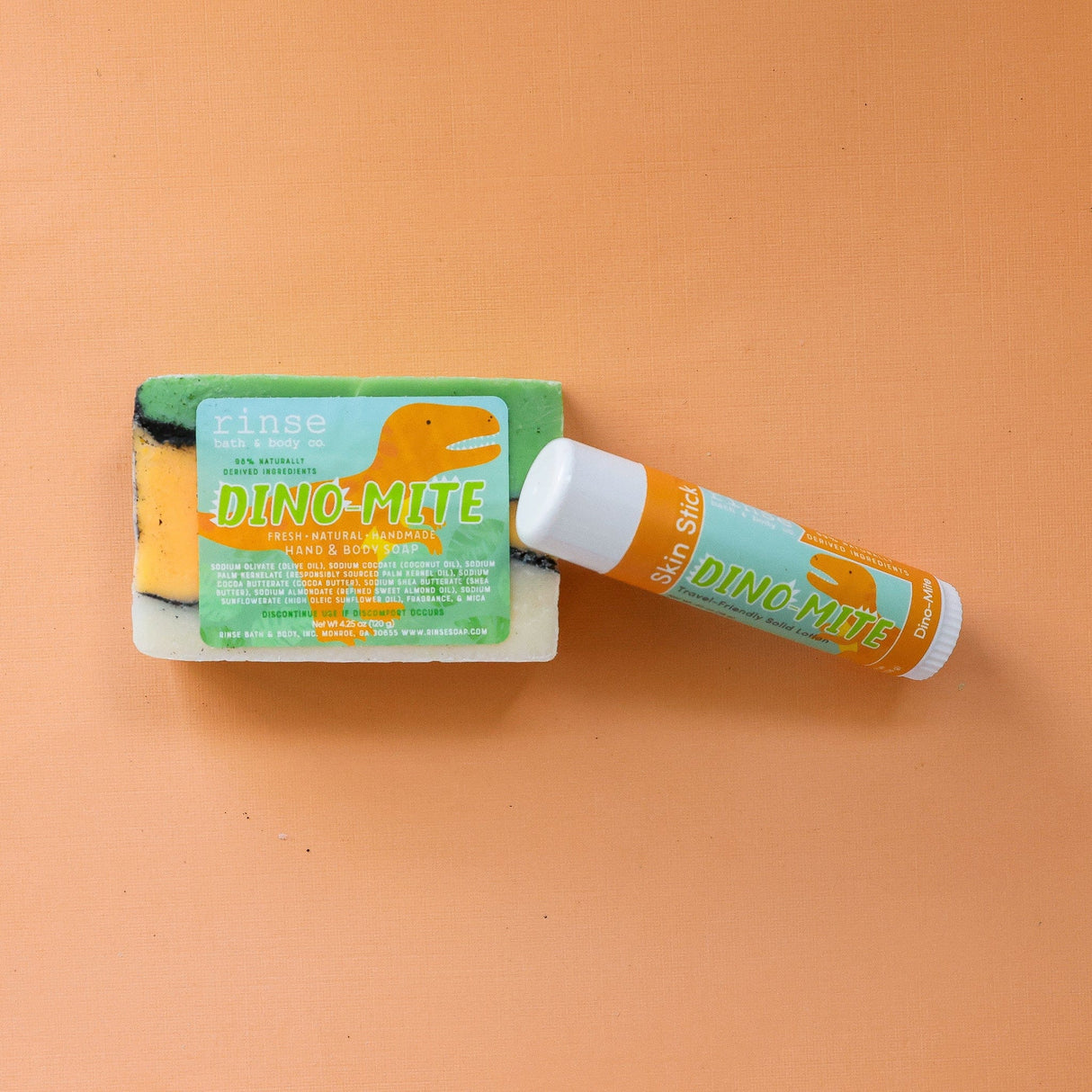 solid lotion stick in Dino Mite by Rinse Bath & Body - alternate angle