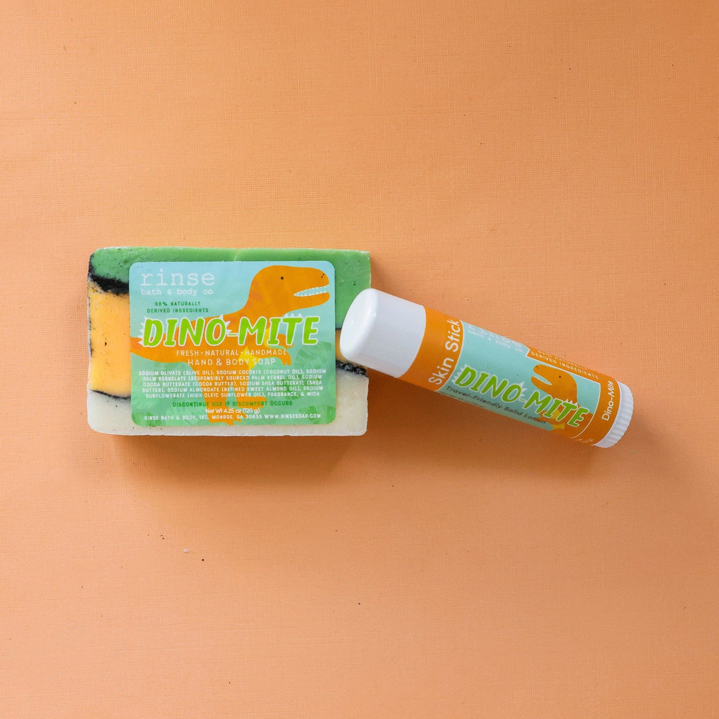 solid lotion stick in Dino Mite by Rinse Bath & Body - alternate angle