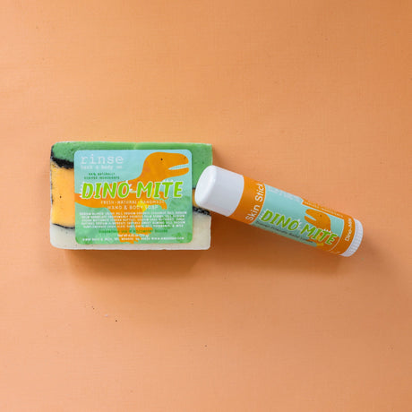 solid lotion stick in Dino Mite by Rinse Bath & Body - alternate angle