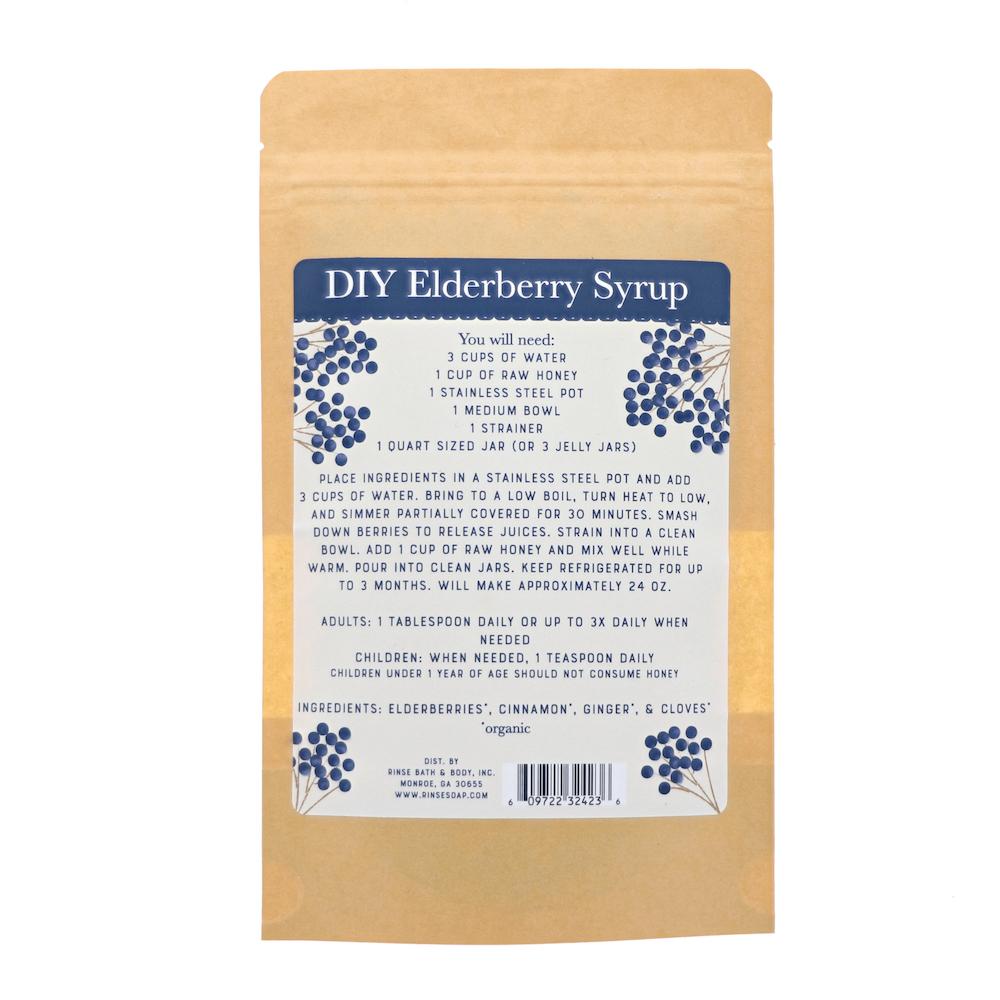 Back of Elderberry syrup kit pouch with DIY directions and spice list — kraft paper standing in clean studio light